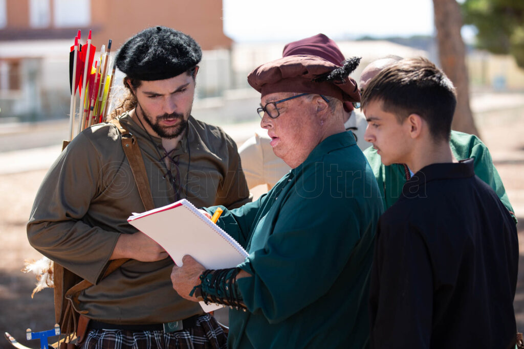 arqueros revisando puntuaciones